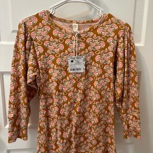 Kate Quinn pink floral snake top